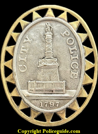Baltimore Police 3rd issue Type 1, the original construction with two pieces, a silver colored center seal soldered to a brass 20 point ringed outer border.. In use from 1862 to 1890. During this period the Type 2 was introduced which was cheaper to made with one piece construction all of the same silver colored metal. Baltimore Police 3rd issue Type 1, the original construction with two pieces, a silver colored center seal soldered to a brass 20 point ringed outer border.. In use from 1862 to 1890. During this period the Type 2 was introduced which was cheaper to made with one piece construction all of the same silver colored metal.