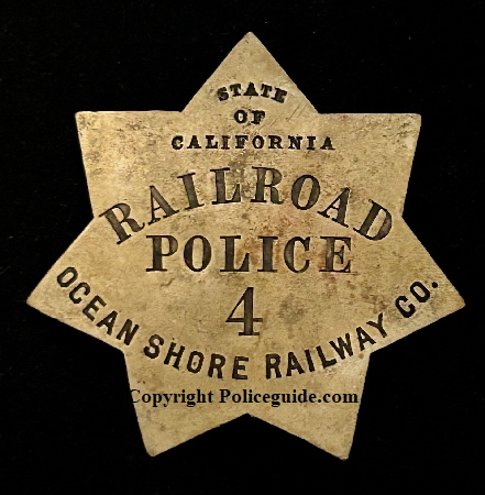 Ocean Shore Railway Co. Police badge #4.   The Ocean Shore Railway was a railroad built between San Francisco and Tunitas Glen, and Swanton and Santa Cruz that operated along the Pacific coastline from 1905 until 1921. The route was originally conceived to be a continuous line between San Francisco and Santa Cruz, but the 1906 San Francisco Earthquake, financial difficulties, and the advent of the automobile caused the line to never reach its goals, and remain with a Northern and Southern division.