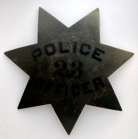 Oakland Pie Plate Police badge #23 last worn by J. J. OConnell who was appointed 3-21-1912.
