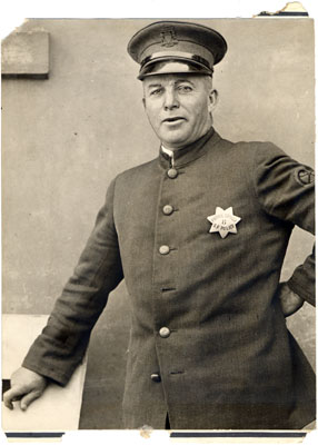Photo of Spike Hennessey, San Francisco Police Patrol Driver wearing badge #8,