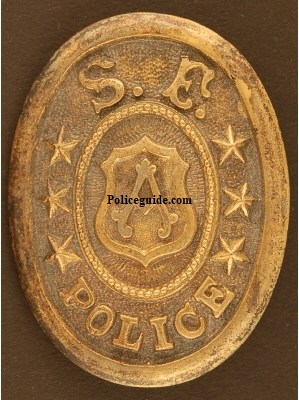 Early San Francisco Police custom die belt buckle and pictured to the right is Lt. Frederick Esola wearing a similar buckle.
