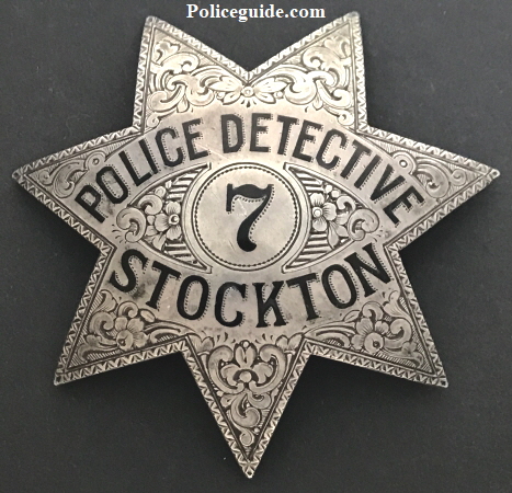 A perfect example of the jewelers art this hand engraved Stockton police detective star #7 is made of sterling silver and hallmarked Ed Jones Co. Oakland.  Circa 1925.