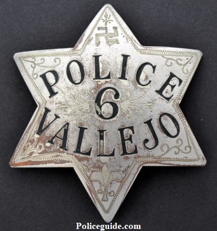 Vallejo Police star #6, worn by George Newton Frazer who served Vallejo Police from 1905 till he started as a Solano Co. deputy sheriff in 1927.  Hallmarked by Irvine W. & Jachens.  Hand etching appears added after the badge was issued including the Swastika which was a good luck symbol for hundreds of years before the Nazis used it.