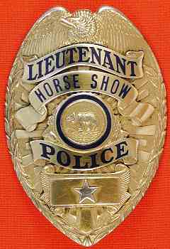 Sterling silver, gold washed Lt. Horse Show Police badge.  Made by L. A. Stamp and Stationary Co. L.A.