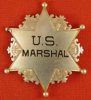 14k gold badge is named on the back to G. N. Wiswell, the Marshal of Wisconsin who was appointed in 1890. 14k gold badge is named on the back to G. N. Wiswell, the Marshal of Wisconsin who was appointed in 1890.