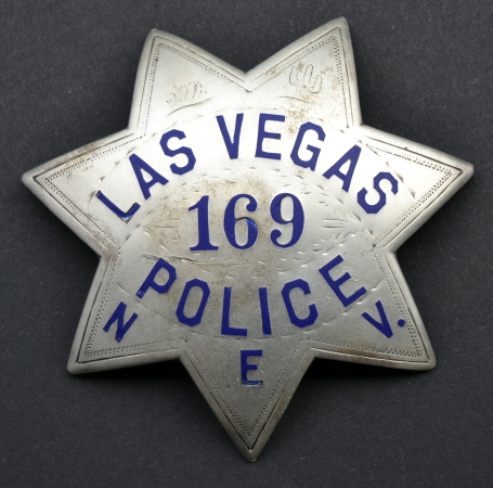 City of Las Vegas Police badge #169, worn by Ronald P. Oldham, made of sterling silver  by Irvine & Jachens S. F. 