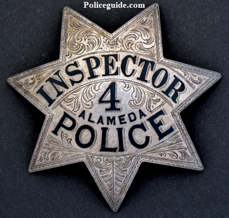 Alameda Police Inspector badge #4 is sterling silver and hallmarked by Ed Jones Co. Oakland, CAL. 