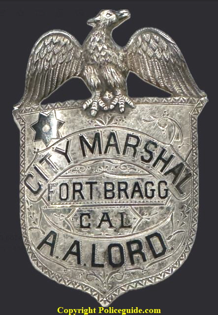 City Marshal Fort Bragg CAL shield of A. A. Lord, made of sterling silver with hard fired black enamel and hand engraved.
