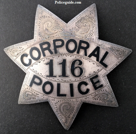 Corporal Oakland Police #116. Sterling silver, hand engraved, hallmarked Pioneer Oakland, CAL.  Worn by Peter H. Van Houtte who went on to become an Inspector.