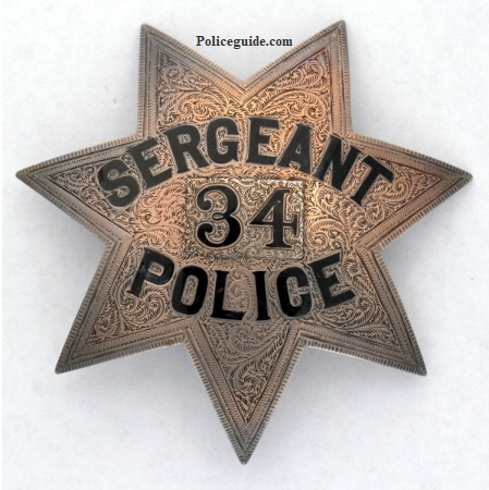 Sergeant Oakland Police #34. Sterling silver, hand engraved.  Notice the numbers were changed. Circa 1870.