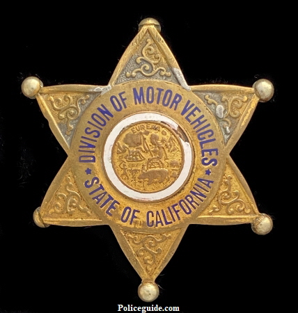 Division of Motor Vehicles State of California badge.