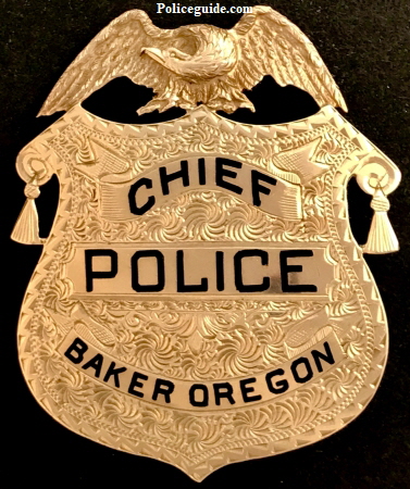 1k gold Baker Oregon Chief of Police badge presented to Walter E. Palmer. 1k gold Baker Oregon Chief of Police badge presented to Walter E. Palmer.