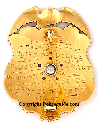 Back of badge showing presentation and hallmark. “ Presented to Chief of Police Robert P. Tracy by members of Oakland Police Dept. 1943. Made by Block Jewelery Oakland, CAL. 14k gold in 1943. Back of badge showing presentation and hallmark. “ Presented to Chief of Police Robert P. Tracy by members of Oakland Police Dept. 1943. Made by Block Jewelery Oakland, CAL. 14k gold in 1943.