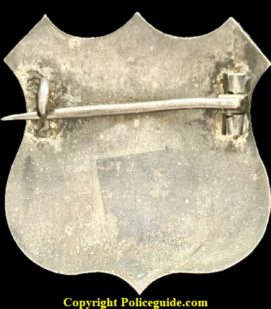 Denver City Marshal shield made of sterling silver with hard fired black enamel.  Jeweler made.  Worn by David Cook who served from 1866 to 1869