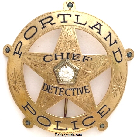 Portland Police Chief Detective, hand engraved, 14k gold with a one karat diamond.