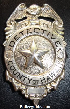 Detective County of Hawaii, reverse is stamped STERLING.