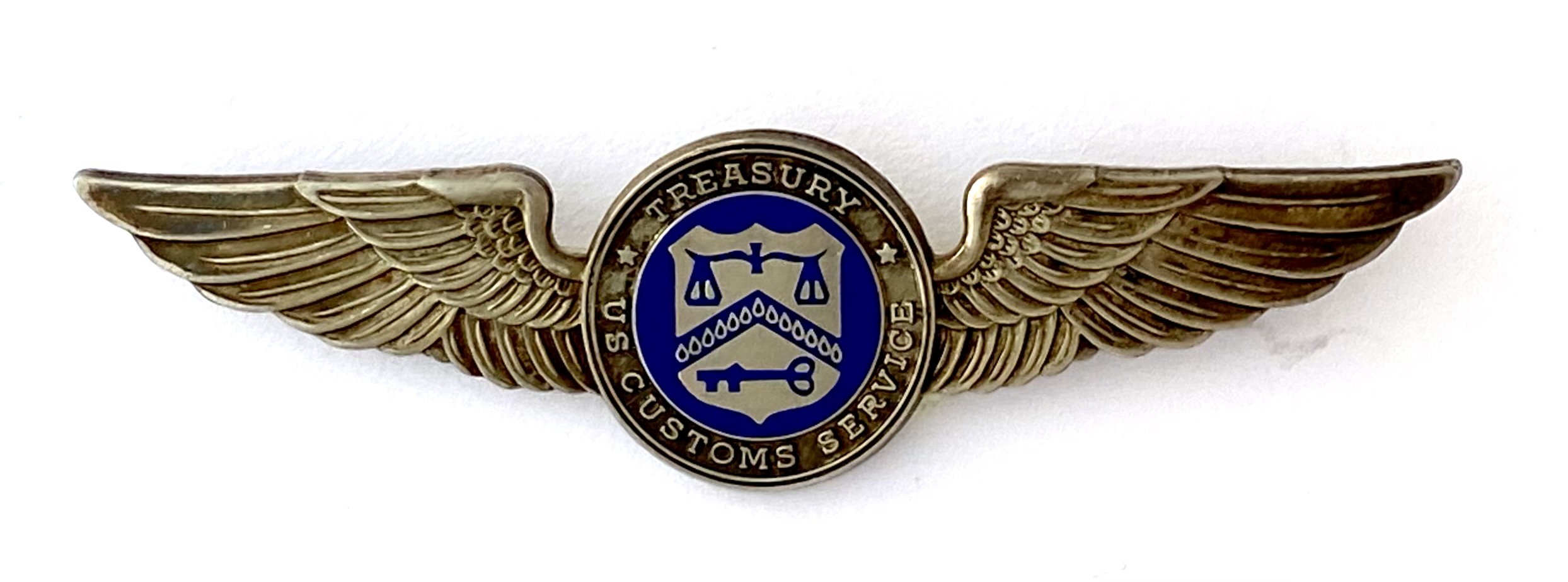 Treasury U. S. Customs Service sterling wings.