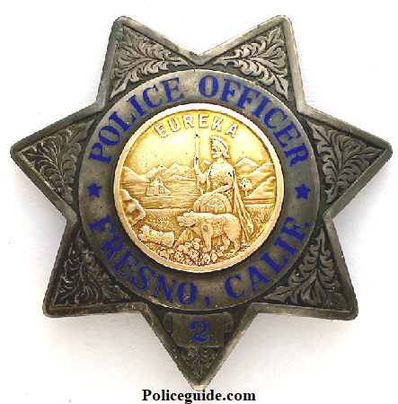 Fresno PD badge No. 2, made of sterling silver with a gold front center seal.  Made by L. A. Stamp & Stat'y.  