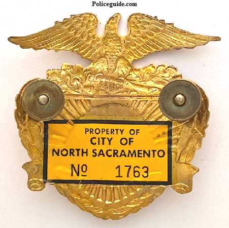 Geo. Suggett No. Sac Chief hat badge.