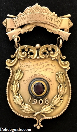 Gold shooting medal presented by a Sacramento merchant Kimball & Son Co. in 1906 at the Northern California Championship shooting tournament.