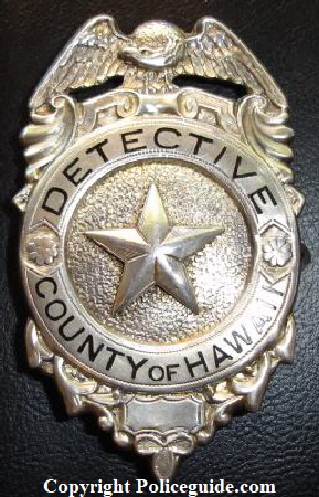 Detective County of Hawaii, reverse is stamped STERLING.