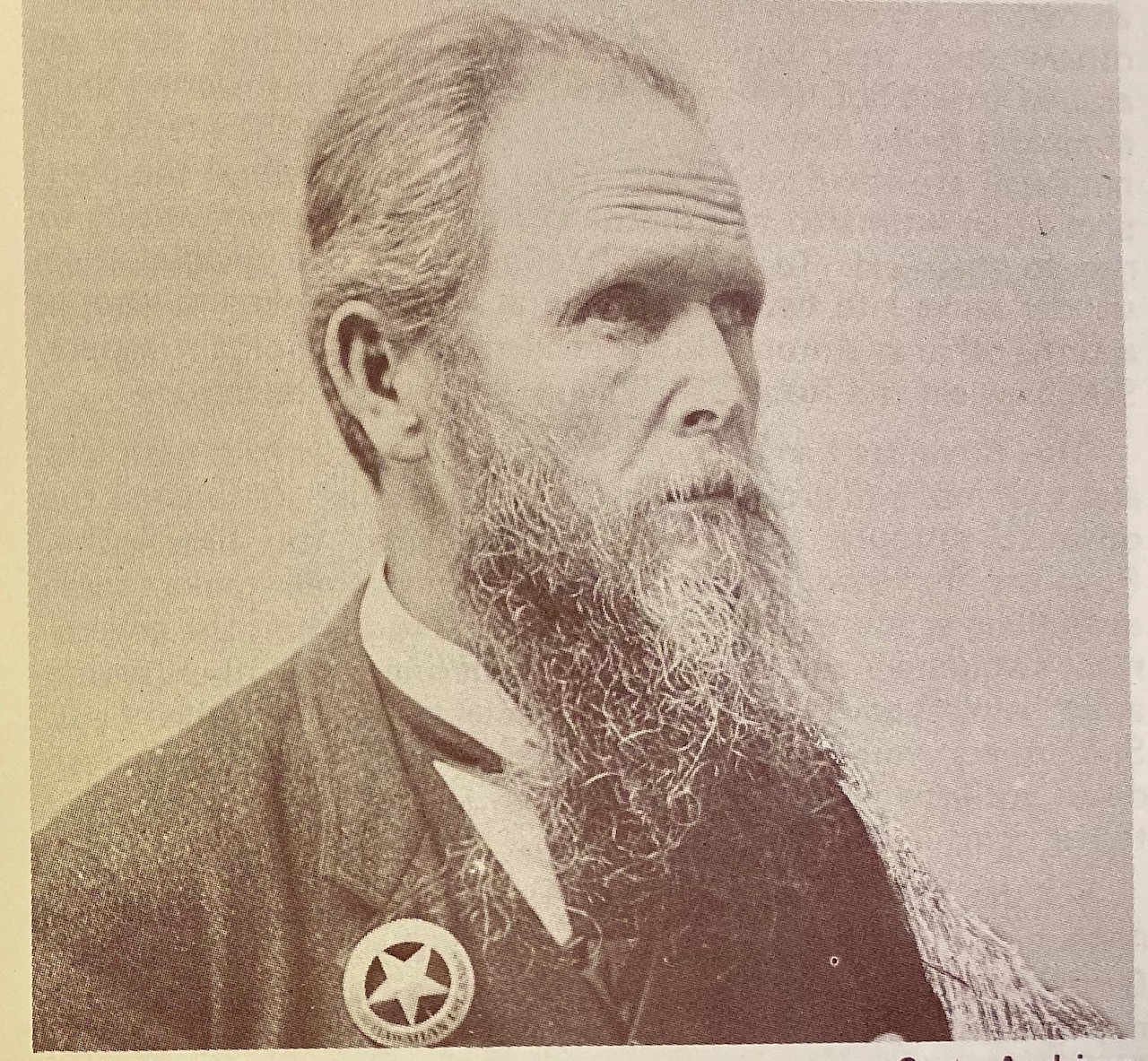 Portrait of Sheriff Hitchcock wearing his 14k gold Sheriff of the Island of Hawaii badge.  It is known that he had at least two 14k Sheriff badges.