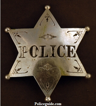 Rochester IN Police badge worn by Mel True.