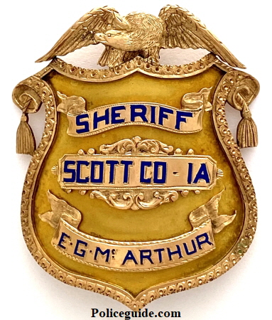 Scott Co Iowa Sheriff badge in 14k named to E. G. Mc Arthur