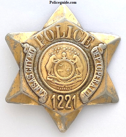 Kansas City MO Police Radio  badge No. 1221.