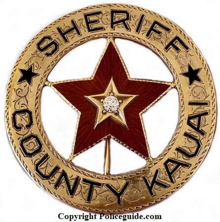 14k gold presentation badge to Wm. Henry Rice, Sheriff of the County of Kauai in 1907.