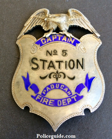 Captain No 5 Station Paducah Fire Dept. sterling silver presentation badge.  Obverse reads Presented to Capt. T. P. Glenn by W. F. Mc C. / G. H. B. - Chas. W.