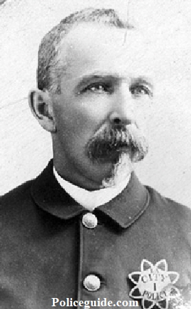 Cabinet card image showing a Los Angeles policeman wearing badge #1 of the first issue.