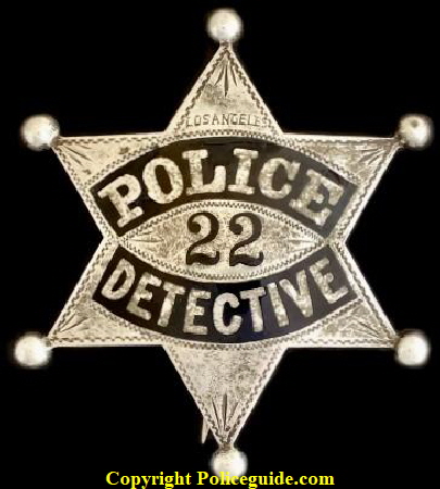 LAPD Series 2 Police Detective No. 22, made of sterling silver with hard fired black enamel lettering.