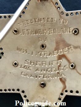 Reverse of Deputy Sheriff badge Presented to Arthur K. Bourne 