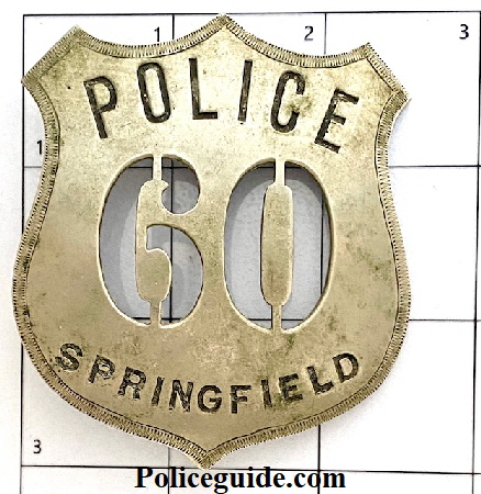 Springfield #60 badge made by C. D. Reese.