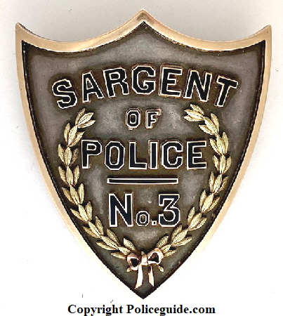 Sargent (German Spelling) of Police No. 3 St. Louis, MO Police Dept.  Made of sterling & gold.  Presented to Sgt. Anderson T. Shipp.