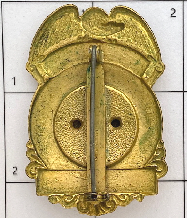 Back of Naval Intelligence badge issued to John J. Skelling in Brooklyn, N. Y