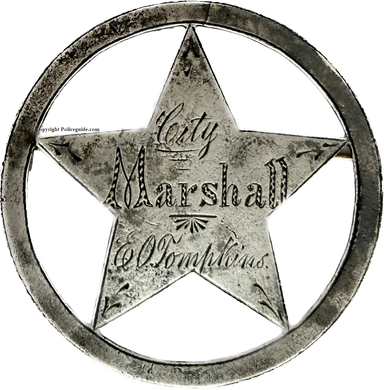City Marshall  E. O. Tompkins     Nevada Ctiy, CAL   1858 - 1859   Made of sheet silver with hand engraved lettering.   