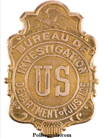 Bureau of Investigation US Department of Justice shield.   It appears to be gold-plated brass and is stamped on the back "Whitehead & Hoag Newark, N.J. Gold Filled" and "553". An eagle appears at top and a shield at the bottom. The background is stippled. Superb detail throughout. It has a C-type pin attachment on the verso. This type of badge saw use between 1908 and 1927. The Bureau of Investigation later became the Federal Bureau of Investigation (F.B.I.) beginning in 1935.