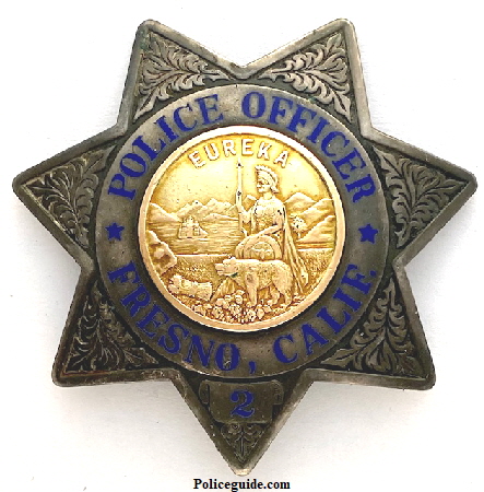 Fresno PD badge No. 2, made of sterling silver with a gold front center seal.  Made by L. A. Stamp & Stat'y.  