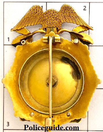 Back of John F. Hylan”s 18k gold badge, “The Mayor” Police Department City of New York.  