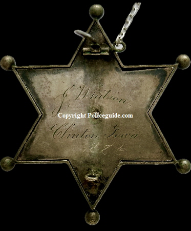 Back of Chief of Police presentation badge to J. Whitson Clinton, Iowa 1886.  Jeweler made, sterling silver.