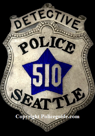 Seattle Police Detective 510 made of sterling silver with hard fired blue enamel.