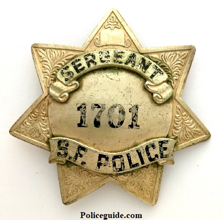 Warner Bros. Prop badge for S.F. Police Sergeant  # 1701 made by Los Angeles  Stamp & Stat'y Co. Los Angeles.