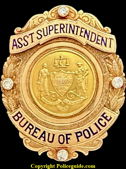Caleb J. Brinton’s 14k gold, diamond studded Assistant Superintentent Bureau of Police Presentation shield.