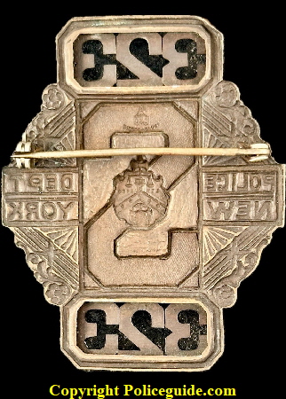 New York Police shield No. 323 for the Prohibition Special Unit. New York Police shield No. 323 for the Prohibition Special Unit.