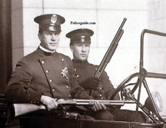 Oakland Police Officer Edward K. Long seated on the passenger side.