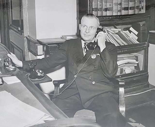 RPT at his desk