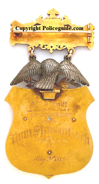 Superintendent Cleveland Police presentation badge to Jacob W. Schmitt on his 25th anniversary with the department., dated May 20th, 1882