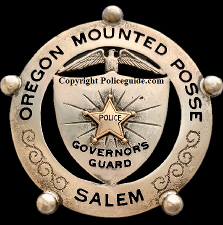 Oregon Mounted Posse Salem Governor's Guard badge, made of sterling and gold with hard fired black enamel.